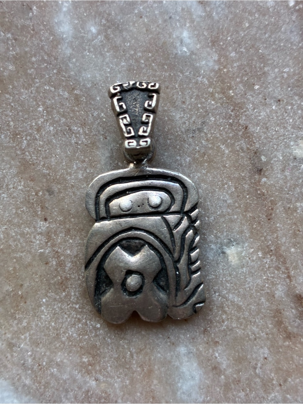Tribal-Inspired or Mayan pendant.